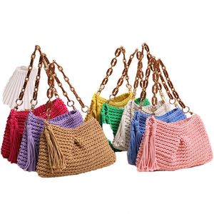 กระเป๋าถือถักไหมพรมอะคริลิคดีไซน์ล่าสุด พร้อมพู่ห้อย เหมาะสำหรับวันหยุดพักผ่อนริมชายหาด - Product Image 1