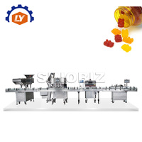 Ligne de production automatique d'emballages d'embouteillage pour comptage de grains
