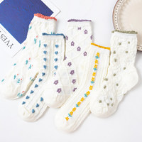 Chaussettes de curling brodées de fleurs colorées Motif coeur Chaussettes d'équipage géométriques en coton à haute élasticité