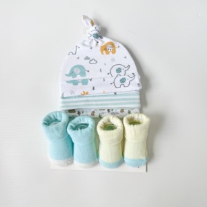 Venta al por mayor de bonitos gorros y calcetines neutros para recién nacidos, conjunto de gorro y calcetines para bebés recién nacidos, calcetines lisos para bebés - Product Image 1