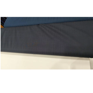Tissu écologique tissé à carreaux bleu foncé pour costumes homme et fille, idéal pour la confection de pantalons et de blazers de cérémonie - Product Image 1