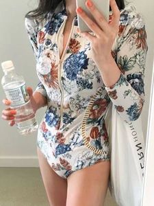 Traje <span class=keywords><strong>de</strong></span> <span class=keywords><strong>Baño</strong></span> <span class=keywords><strong>de</strong></span> Una Pieza para <span class=keywords><strong>Mujer</strong></span>, Diseño OEM ODM, Ajustado, Adelgazante, con Protección Solar, <span class=keywords><strong>Manga</strong></span> <span class=keywords><strong>Larga</strong></span>, Cierre <span class=keywords><strong>de</strong></span> Cremallera, Estampado Floral, Traje <span class=keywords><strong>de</strong></span> Buceo - Product Image 1