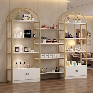 Étagère de présentation cosmétique de luxe avec cadre doré, présentoir autoportant arqué avec <span class=keywords><strong>armoire</strong></span> de rangement pour les boutiques de beauté - Product Image 1