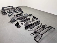 Nouveau kit carrosserie complet de mise à niveau pour pare-chocs avant/arrière avec barre de protection, crochet de remorquage et attaches pour Mercedes Classe G W464 2019-2024 et W465 2025+ AMG