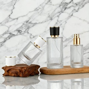 Venta Caliente de Botellas de Perfume de Vidrio Cilíndricas de 30ml 50ml 100ml con Pulverizador, Cabezas de Bomba y <span class=keywords><strong>Tapas.</strong></span> Logotipos Impresos en Serigrafía Personalizados. Embalaje Exterior - Product Image 4