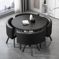 Ensemble de salle à manger moderne et luxueux avec table ronde en bois et 4 chaises rembourrées en métal pour la salle à manger