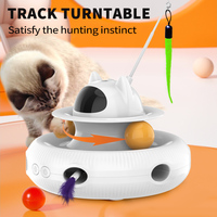 Vente en gros de jouets pour chat interactifs, écologiques, en silicone et plastique, avec design de dessin animé, simple, intelligent, à plumes laser, rechargeable par USB