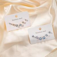 Pendientes de tuerca de acero inoxidable con circonitas engastadas en forma de garra, juego de pendientes pequeños, juego de tres piezas de pendientes de tuerca redondos con circonitas.