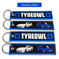 Porte-clés promotionnels personnalisés en tissu brodé de haute qualité avec étiquette tissée, porte-clés brodé personnalisé en forme de jet tag