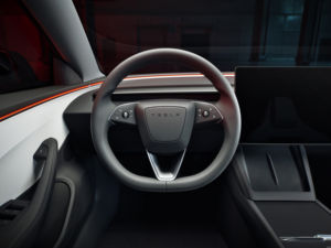 Tesla Model 3 d'occasion 2024, voiture électrique à énergie nouvelle, traction avant, boîte de vitesses automatique, conduite à gauche, sièges en cuir, jantes en alliage d'aluminium R21, couleur foncée - Product Image 5