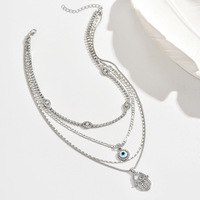 Collier pendentif œil porte-bonheur en alliage de zinc avec strass, bijoux superposables et imposants pour femme, tendance