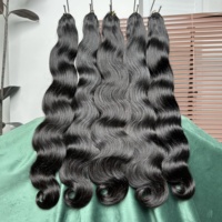 # Extensions de cheveux humains vietnamiens bruts non traités, qualité 12A, noir naturel 1B, ondulés, pour crochet, vente en gros