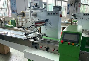 <span class=keywords><strong>Machine</strong></span> d'emballage pour gâteaux compacts, gaufrettes, bâtonnets, <span class=keywords><strong>pain</strong></span> de dattes, pains, aliments, viande, poulet, et sachets coussin - Product Image 3