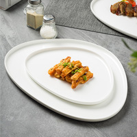 Assiette de table en porcelaine brillante en forme de goutte d'eau blanc pur pour buffet d'hôtel, steak, aliments frits, vente en gros