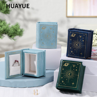 Boîte d'emballage de bijoux en cuir PU en forme de livre, style personnalisé Huayue, pour boucles d'oreilles et colliers