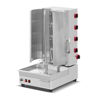 Machine Sharwama à pierre de lave à quatre brûleurs en acier inoxydable Charcoal Kebab Doner Grill