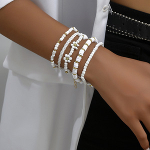 Fashionable and versatile creative color-blocked seed bead flower stacked <b>bracelet</b> <b>set</b>, simple design, hand-woven elastic - Product Image 1