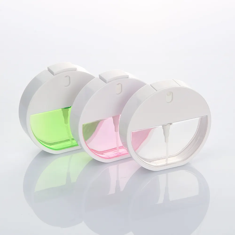 Hot selling pink green empty 30ml plastic round alcohol perfume refillable credit card fine mist spray bottle for hand sanitizer