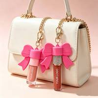 Porte-clés mignon avec capuchon en forme de nœud pour brillant à lèvres, brillant à lèvres végétalien, waterproof, longue tenue, hydratant, huile à lèvres marque privée