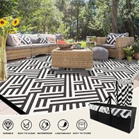 Les fabricants fournissent des tapis d'extérieur tissés en PP à double couche pour jardin, écran solaire, tapis anti-âge pour VR, hauteur de pile en peluche
