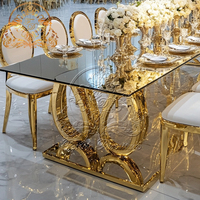 Tables à manger modernes de style indien avec plateau en verre et base en acier inoxydable sculpté, pour les salles de réception, les mariages, les hôtels, de bonne qualité