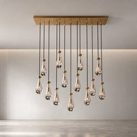 Lustre suspendu moderne en verre en forme de goutte d'eau, finition laiton, pour projets de hall d'hôtel et de salle à manger