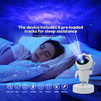 Haut de gamme astronaute Laser étoile nébuleuse projecteur multicolore galaxie LED lampe de bureau pour chambre atmosphère décor veilleuse en gros