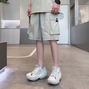 กางเกงขาสั้นสีกากีอเมริกันสำหรับผู้ชายกางเกงห้าส่วนทรงหลวมระบายอากาศแบบลำลองบางแบรนด์แฟชั่น2025ฤดูร้อนออกแบบโลโก้ได้ตามต้องการ - Product Image 4