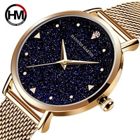 Hannah Martin Montre à cadran pailleté bleu ciel étoilé pour femme Bracelet en maille d'acier inoxydable minimaliste Seiko Quartz 1 an en alliage de verre