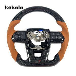 Volante de Fibra de Carbono Forjado con Cuero Perforado Marrón para <span class=keywords><strong>Toyota</strong></span> <span class=keywords><strong>Land</strong></span> <span class=keywords><strong>Cruiser</strong></span> LC300 2022 <span class=keywords><strong>2023</strong></span> 2024 2025 <span class=keywords><strong>GR</strong></span> Sport VXR - Product Image 1