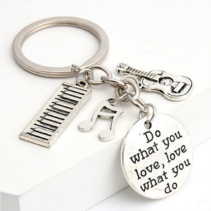 Llavero Decorativo Creativo para Colgar, con <span class=keywords><strong>la</strong></span> Frase 'Haz lo <span class=keywords><strong>que</strong></span> Amas, Amas lo <span class=keywords><strong>que</strong></span> Haces', con Notas Musicales, Guitarra, Piano - Product Image 1