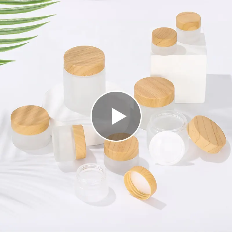 Confezione di moda 50G vaso cosmetico bottiglia di vetro smerigliato trasparente bottiglia di vetro cosmetica coperchio in plastica con grafica in legno