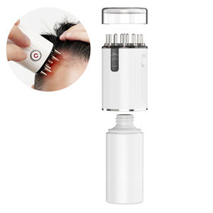 Elektrischer Handkamm mit Öl-Applikator-Kugel und Wurzelkamm Kopfhautmassagegerät - Product Image 1