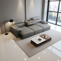 Canapé-lit modulaire pliant en cuir crème moderne avec rembourrage en éponge et design rétractable électrique pour appartement et hôtel (trois places)