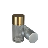 PET100ccLa bouteille blanche transparente en matériau semblable à un métal est utilisée pour contenir des capsules et des produits de soins de santé