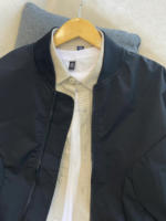 Veste d'uniforme de baseball personnalisée de style européen et américain pour hommes et femmes toile de haute qualité avec fermeture éclair décontractée col montant logo à l'avant
