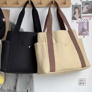 女性のためのレトロな大容量ポータブルキャンバスショルダーバッグプレッピーハンドバッグ