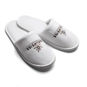 Hot deal corallo in pile morbido bianco pantofole usa e getta Logo personalizzato per le vie aeree dell'hotel