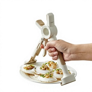 Pinza de silicona 2 en 1 multiusos anti-escaldaduras para platos calientes, cuencos, platos, cucharas y ollas - Product Image 1