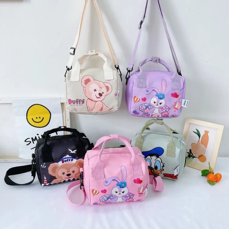 Kaijie Korean version children handbag fashion cartoon print girl portable canvas bag cute princess cross bag graffiti bento bag