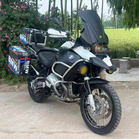 Moto de tourisme R1200GS Adventure, excellent état. Moteur Boxer Twin de 1200 cm³ refroidi par liquide, freins ABS et bagages complets