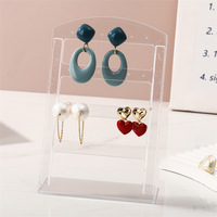 Présentoir à boucles d'oreilles rectangulaire en acrylique à 24 trous, design découpé, support de rangement moderne à quatre niveaux
