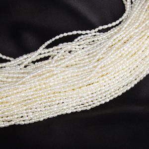 Perles d'eau douce en vrac de forme millet, extrêmement petites, à forte brillance, perles de riz naturelles de 1,8 mm, vente en gros du fabricant - Product Image 1