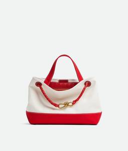 Sac à main Bottega BV Andiamo en toile bicolore avec détail de nœud signature et bandoulière coulissante en cuir Veneta - Product Image 1