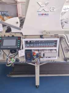 Nouvelle machine automatique <span class=keywords><strong>d</strong></span>'étalement et de <span class=keywords><strong>d</strong></span>écoupe de vêtements en acier <span class=keywords><strong>à</strong></span> alignement de bord de précision, certifiée CE pour la production textile domestique - Product Image 4