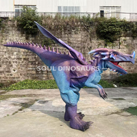 Costume de dinosaure Velociraptor réaliste et personnalisé pour enfants, idéal pour les parcs d'aventure, avec structure en acier légère et imperméable, parfait pour les centres commerciaux