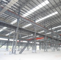 Atelier en structure métallique préfabriquée à grande portée, conception, fabrication et installation sur site, support technique, garantie de 5 ans