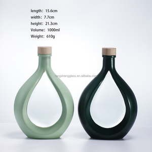 <span class=keywords><strong>Bottiglia</strong></span> di <span class=keywords><strong>Vetro</strong></span> Personalizzabile da 500ml per Succo di Frutta e Bevande in <span class=keywords><strong>Vetro</strong></span> Verde Trasparente per <span class=keywords><strong>Acqua</strong></span> Miele e Olio d'Oliva - Product Image 1