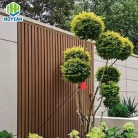 HOYEAH 21926 3D gaufré grain de bois wpc revêtement mural extérieur panneau de façade composite en bois cannelé