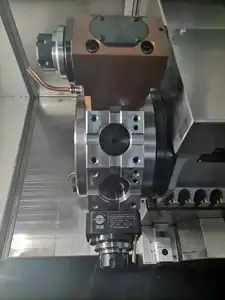 China Tck56y automática Torno CNC máquina centro de torneamento máquina com 12-station Living Tool Torno torneamento e fresadora